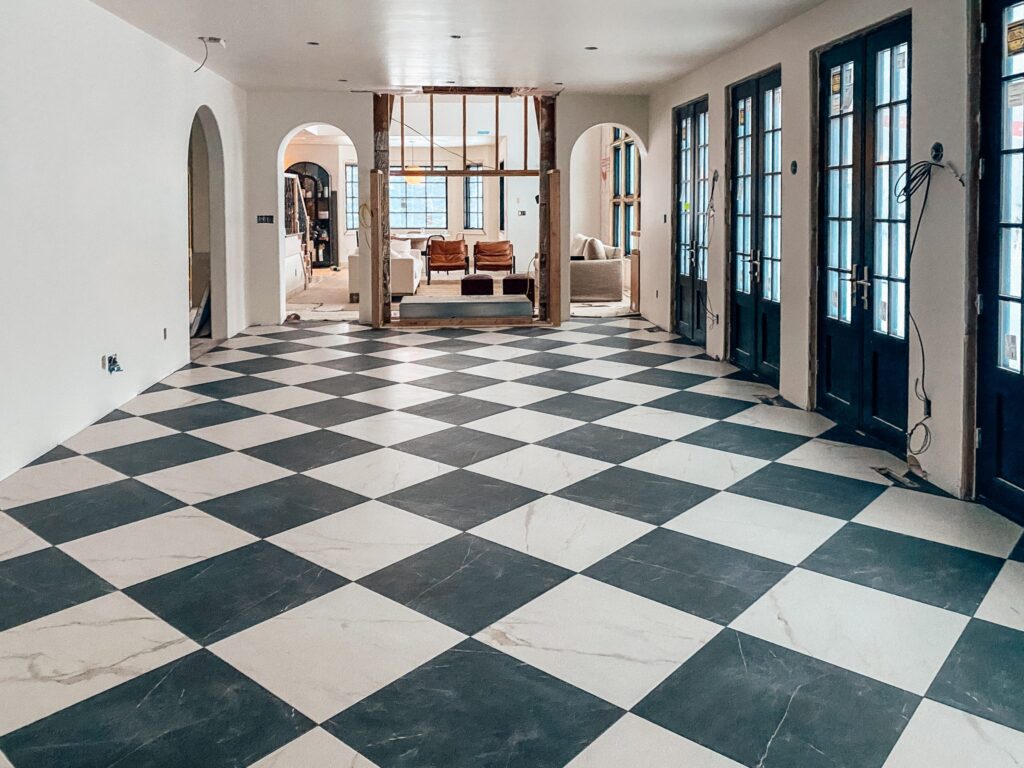Professionally cleaned tile and grout in a room, restored to a bright, fresh finish.